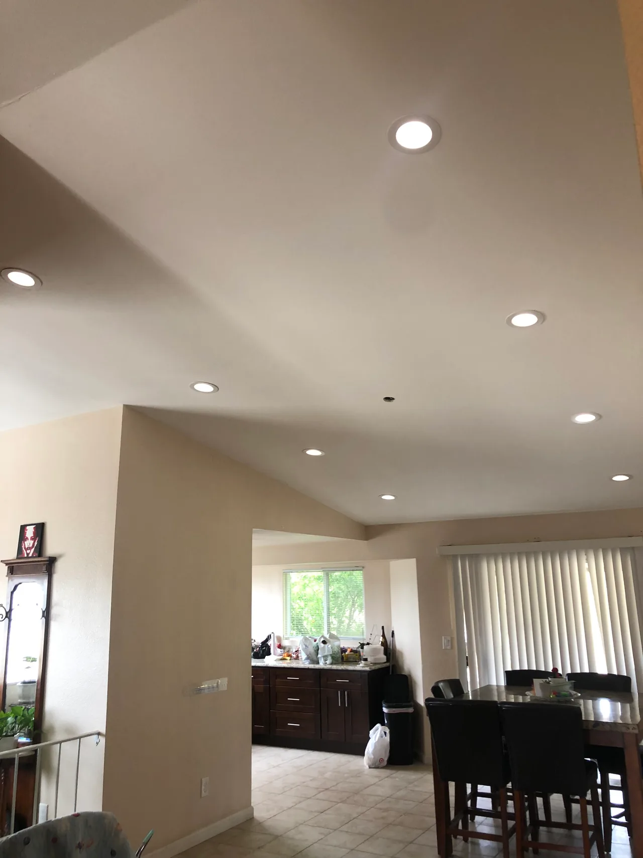 Remodeled living space with recessed ceiling lights